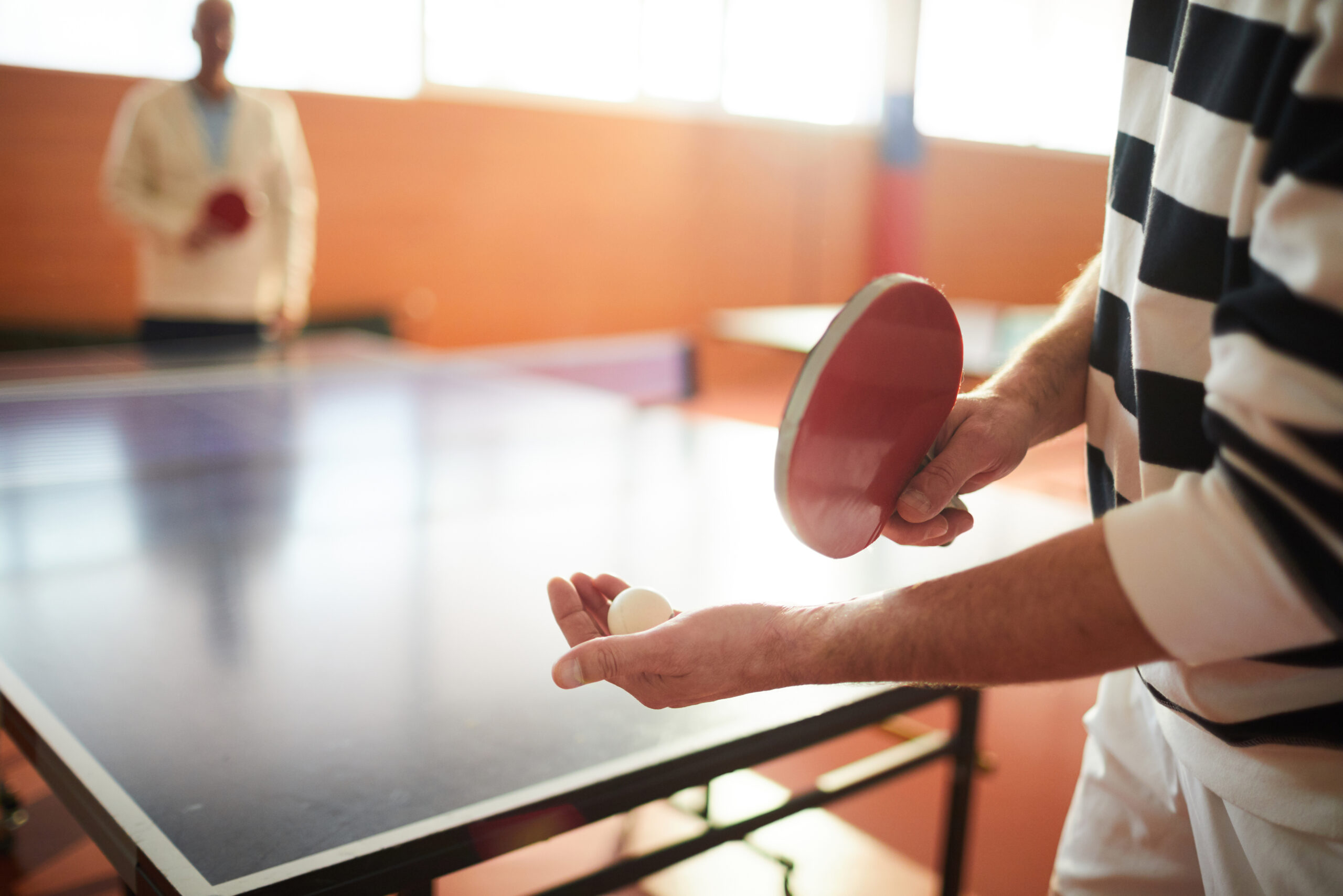 Tennis player One of active tennis players holding racket and ball while going to throw it anf hit